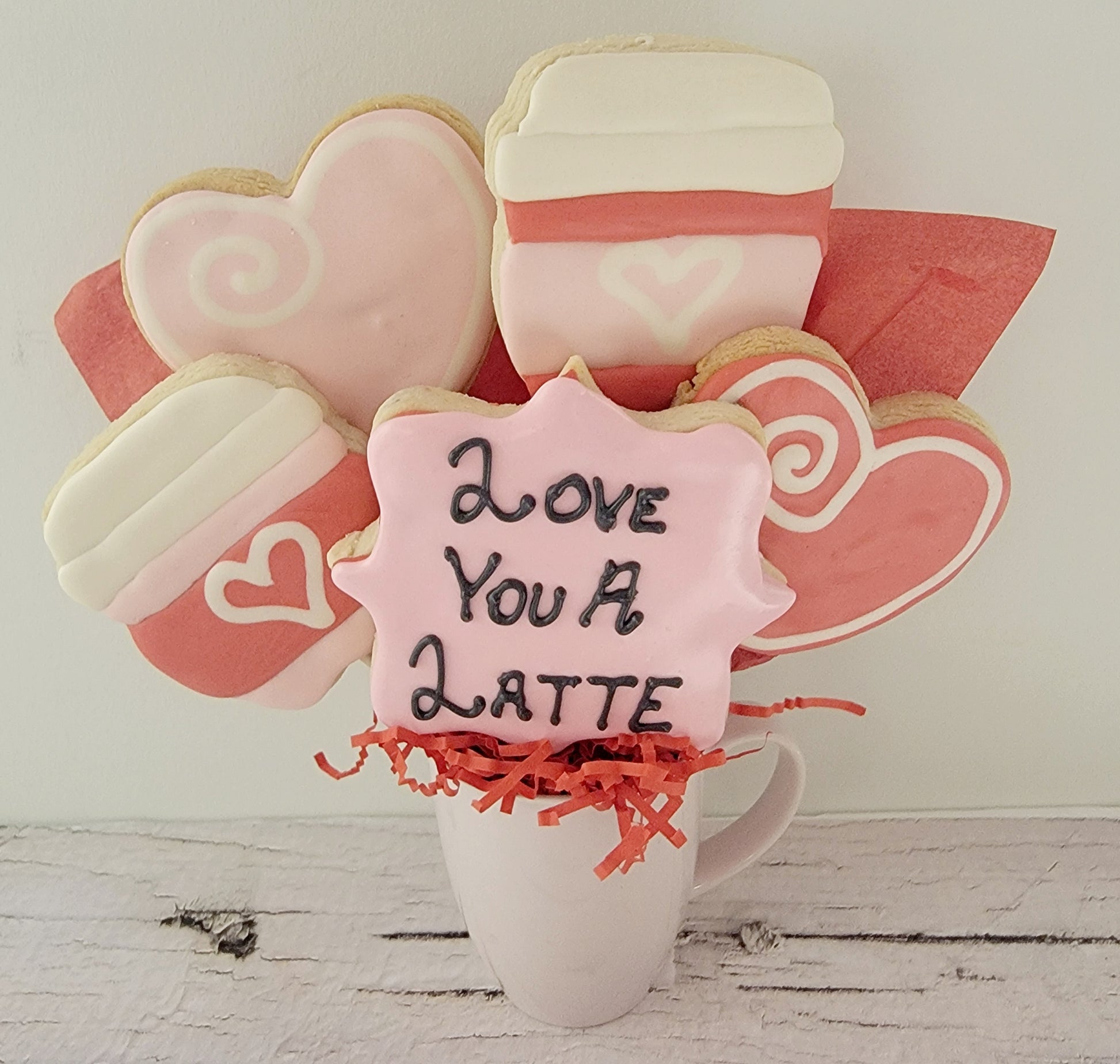 Love You a Latte Cookie Bouquet | Delicious Cookie Arrangement | Cookie Shop in Canada | Winnipeg's Finest Cookies | Gourmet Treats for Every Occasion | Indulge in Canadian Cookie Delights | Perfect Gift for Coffee Lovers | Handcrafted Cookies with Love | Satisfy Your Sweet Cravings with Extravagant Cookies | Unique Edible Gifts for Loved Ones | Premium Quality Cookies Made in Winnipeg | Order Now for Sweet Surprises